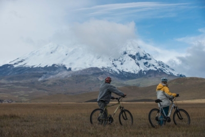 Volcano Biking Ecuador 2 bikers in front of Cotopaxi
